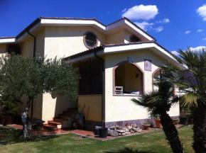 Отель Paoline's suite in villa  Фьюмичино